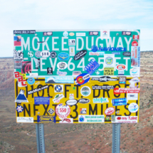 Sign atop the Moki (They mispelled it) Dugway, which drops 1100 feet in 3 miles, Route 261, UT, 2007 Sign atop the Moki (They mispelled it) Dugway on Route 261, UT, Vince Pitelka, 2007