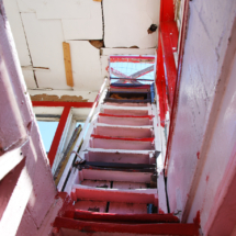 Ladder to the 7th-level observation platform, World's Wonder View Tower, Genoa, CO. Note the wear on the steps. Ladder to the Seventh Level, Worlds Wonderview Tower, Genoa, CO, Vince Pitelka