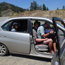 Getting a Ride Into Etna - Etna Summit, CA, 2018 - the driver plus six Pacific Crest Trail thru-hikers and all their gear crammed into a tiny sedan. Six PCT Thru-Hikers and their Packs, Getting a Ride Into Etna - Etna Summit, CA, Vince Pitelka, 2018