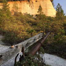 Hydraulic Monitor Still In Place, aimed at the gravel face it was blasting away in 1889. Malakoff Basin, Malakoff-North Bloomfield State Historic Park, San Juan Ridge, CA, 2018 Hydraulic Monitor Still in Place, Malakoff Diggings, Malakoff-North Bloomfield State Historic Park, San Juan Ridge, CA, Vince Pitelka, 2018
