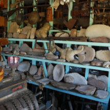 Partial buffalo skull and a collection of Indian grinding stones and other stone tools, World's Wonder View Tower, Genoa, Colorado Buffalo Skull and Indian Stone Tools, Worlds Wonderview Tower, Genoa, CO, Vince Pitelka
