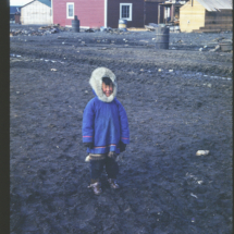 51, June 7 - Barrow Village, Eskimo boy Indigenous Boy, Barrow Village, Point Barrow, AK, 1951, photo by Frank Pitelka