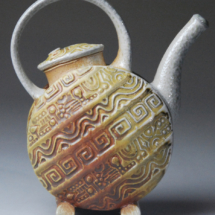 Raw Sienna with heavy soda accumulation on right-hand edge, handle, and spout. Raw Sienna with heavy soda accumulation on right-hand edge, handle, and spout.